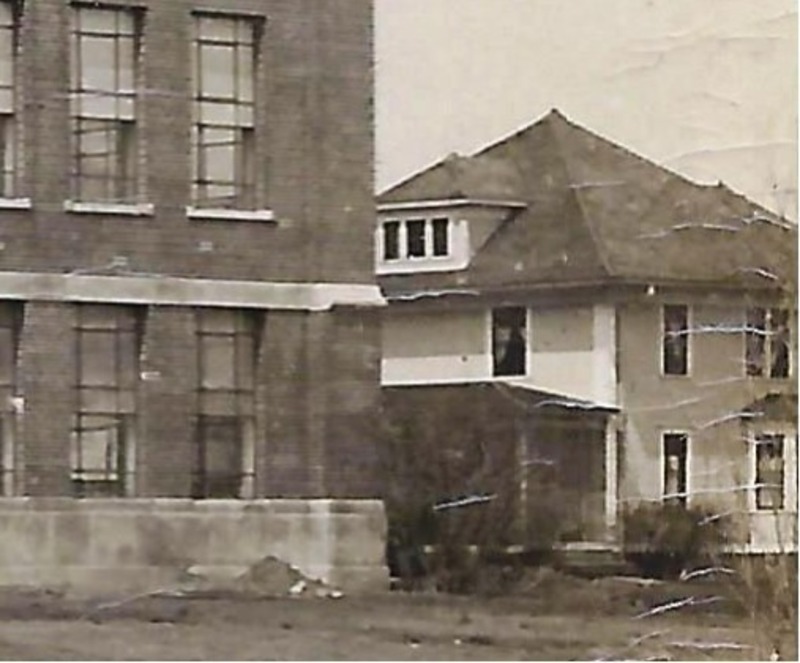 The Grounds Cottage was originally located where the Gilman Hall addition stands now. It was later moved twice. Credit: The Iowa State University Campus and Its Buildings