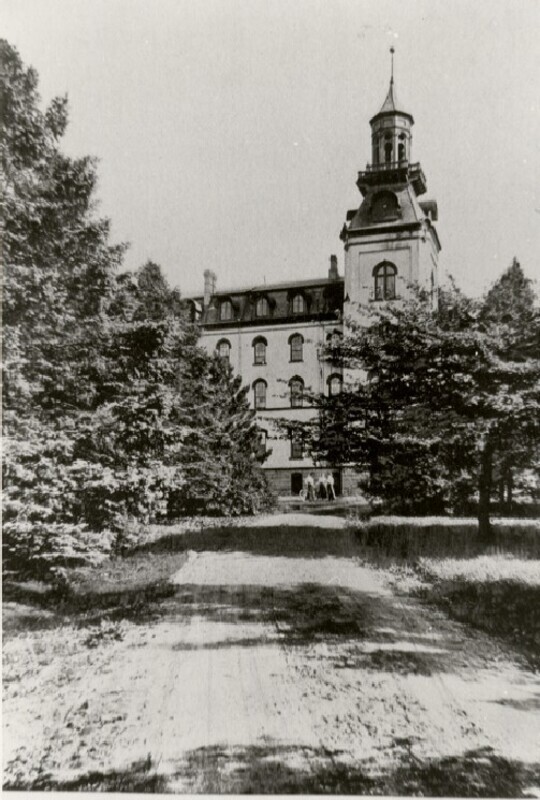 Street view leading up to the side of Old Main 