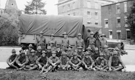 Iowa State University Air Force ROTC in front of U.S.Q.M.C  motor truck