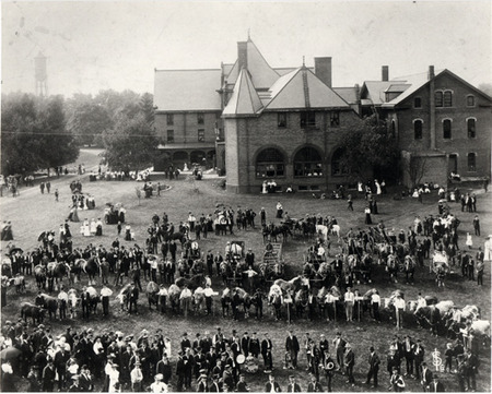 Crowd of people gathered for an event outside Margaret Hall Crowd of people gathered for an event outside Margaret Hall